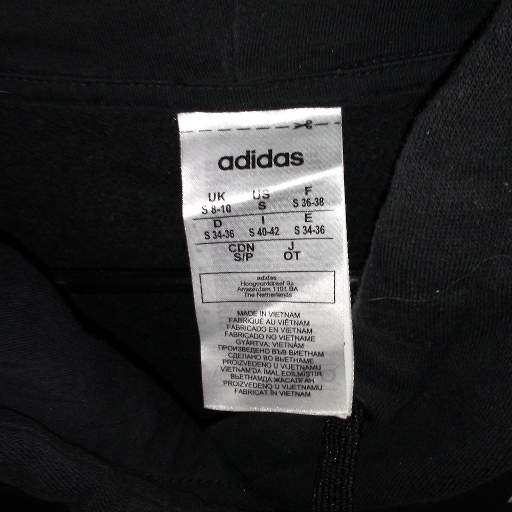 Black Hoodie With White Adidas Symbol